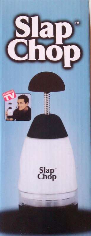 AS SEEN ON TV.....Slap Chop.  Rotating Stainless steel blades.  Butterfly opening to clean blades.