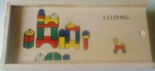 Bright and Colourfull Little wooden blocks in Wooden Tray. All Diffrent shapes
