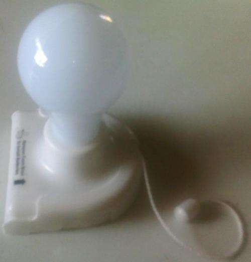 AS SEEN ON TV!! Magic light bulb, no wires or outlets needed. Perfect for camping, powerfailures, ec