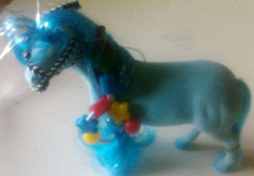 Cute blue pony, with long hair and beads
