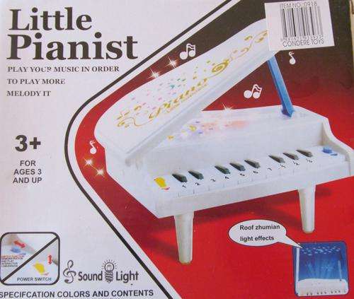 LITTLE PIANIST - with roof light effects!!!! Music and lights. Shipping R40 - FREE additional items