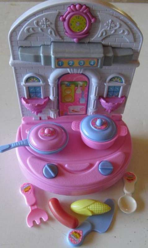 Cute Little stand up kitchen with accessories perfect for Barbie Dolls