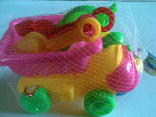 Baby Doggy, sandpit truck with accesories. Postage R30 and R10 per additional item.