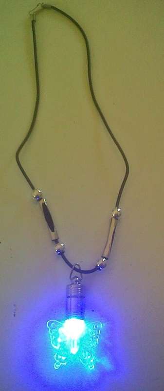Stunning light-up butterfly necklace. Ideal gift for thet little princess.