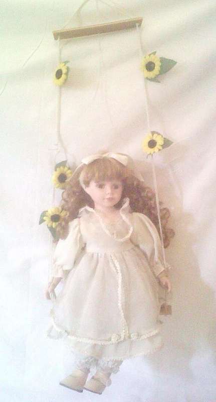 Another Stunning Porcelain doll !!!! Swinging Suezie. Do not miss out on this one.