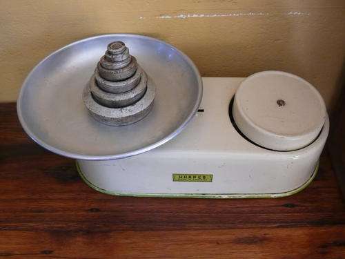 Old kitchen scale with weights