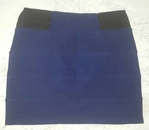 Brand new Navy stretch Mini skirt with black elasticated inserts Size 32.