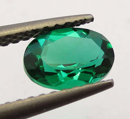 Emerald Simulant. Lab created Gemstone . 7x5mm Oval