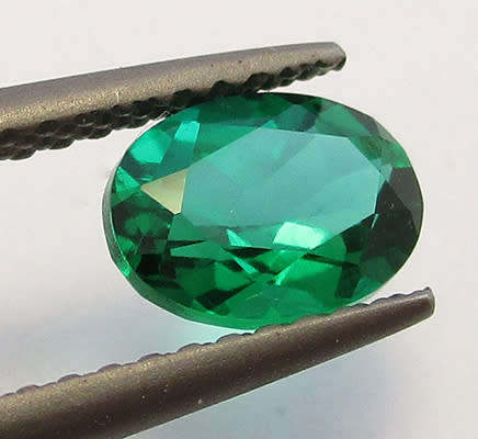 Emerald Simulant. Lab created Gemstone . 7x5mm Oval