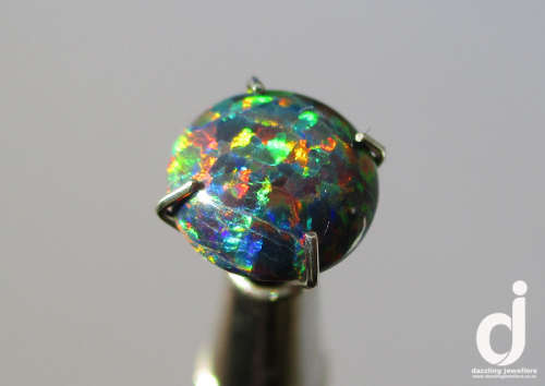 Black Opal Cabochon: 8mm / 0.80ct