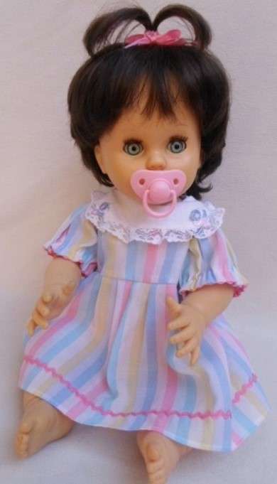 RARE!! A DARK HAIRED 44CM TALL FIRST LOVE DRINK AND WET DOLL AND IN GREAT CONDITION!!