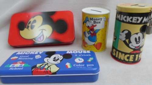 TWO MICKEY MOUSE/DONALD DUCK SAVINGS TINS AND TWO MICKEY PENCIL CASES TO ADD TO YOUR COLLECTION.