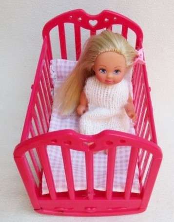 A CUTE LITTLE EVI LOVE IN HER LITTLE COT!!