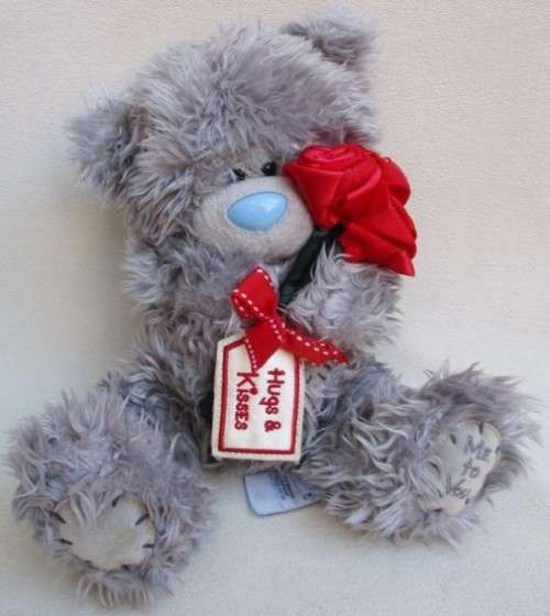 A LARGER TATTY TEDDY  (ME TO YOU) HOLDING A BUNCH OF RED ROSES!!