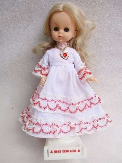 AN EXQUISITE  VINTAGE 'VOGUE? DOLLY IN GREAT CONDITION MARKED 'SYMBOL OF QUALITY HONG KONG'