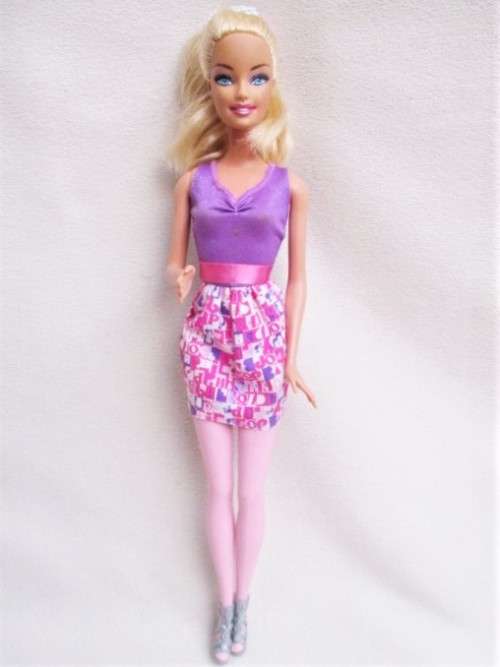 PRETTY MATTEL BARBIE DOLL WITH PINK LEGS!!