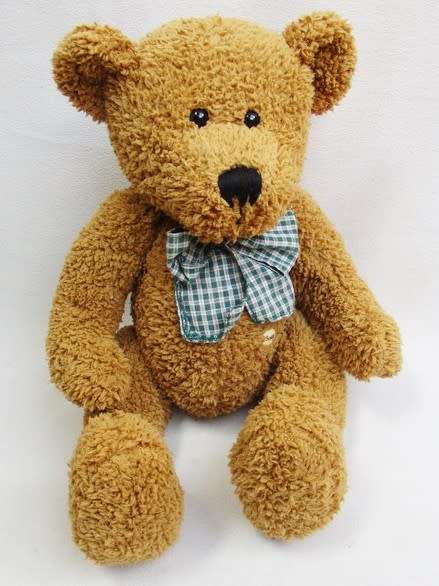 A VERY COLLECTABLE SUNKID, GERMANY WITH ORIGINAL BUTTON AND DROP STITCH NOSE!!
