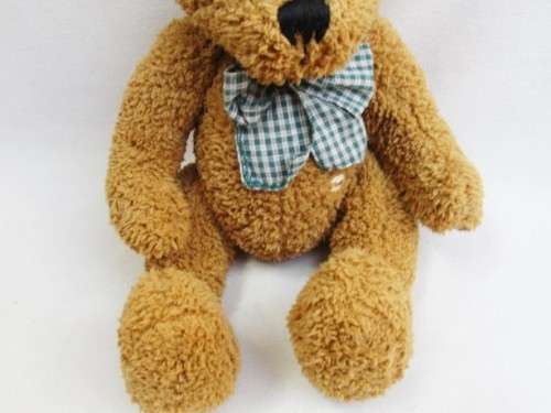 A VERY COLLECTABLE SUNKID, GERMANY WITH ORIGINAL BUTTON AND DROP STITCH NOSE!!