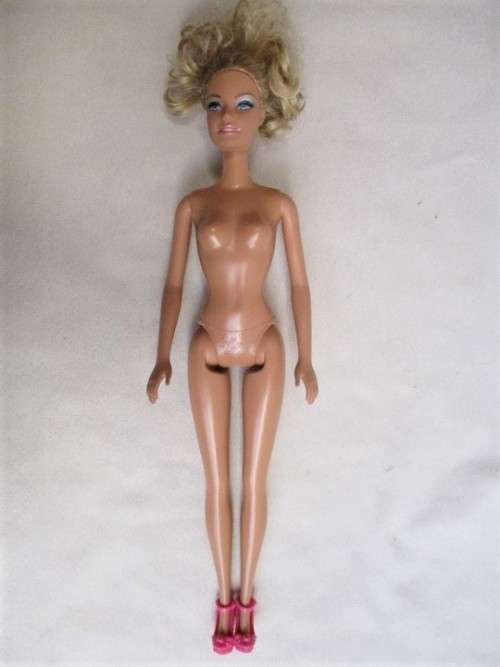 PRETTY CURLY-TOPPED MATTEL BARBIE DOLL
