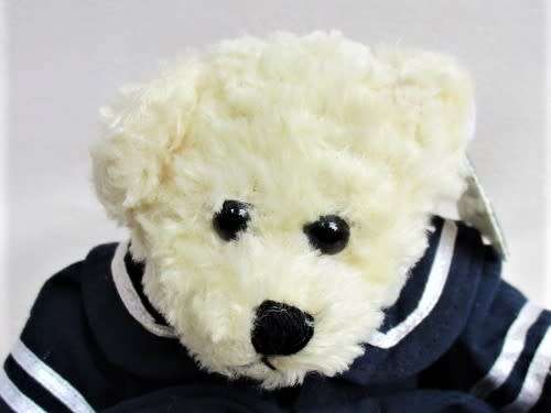 A COLLECTABLE FULLY JOINTED 'UNIPAK' BEAR IN HER CUTE ORIGINAL SAILOR OUTFIT