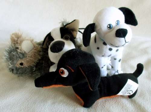 FOUR COLLECTABLE PUPS MADE FOR MCDONALDS