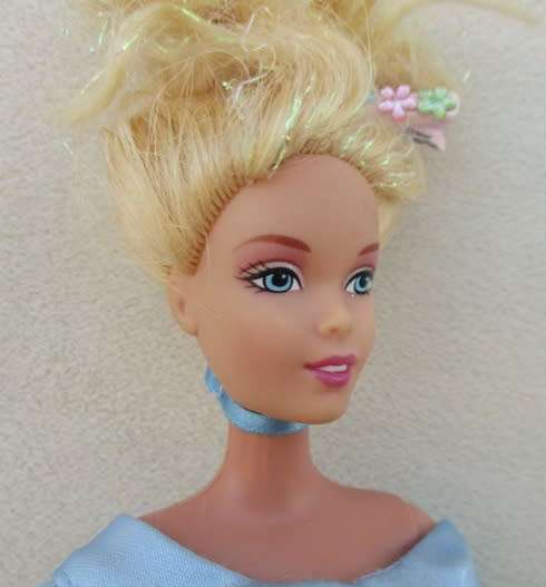 A MATTEL BARBIE DISNEY PRINCESS WITH GLITTER HAIR AND PRETTY DELICATE FACE