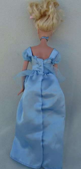 A MATTEL BARBIE DISNEY PRINCESS WITH GLITTER HAIR AND PRETTY DELICATE FACE