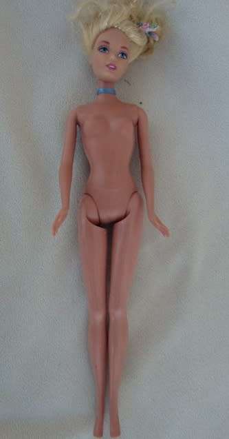 A MATTEL BARBIE DISNEY PRINCESS WITH GLITTER HAIR AND PRETTY DELICATE FACE