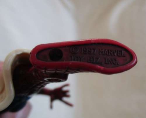 TWO UNUSUAL ARTICULATED ACTION FIGURES - 1997 MARVEL TOY BIZ SPIDERMAN AND UNMARKED SPIDERWOMAN