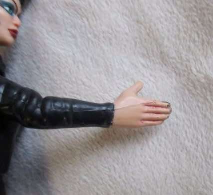 TWO UNUSUAL ARTICULATED ACTION FIGURES - 1997 MARVEL TOY BIZ SPIDERMAN AND UNMARKED SPIDERWOMAN