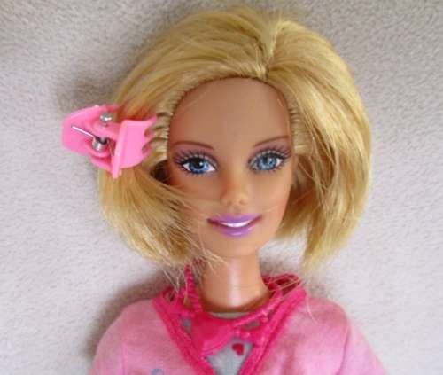 MATTEL  BARBIE DOLL WITH PRETTY BOB HAIRSTYLE AND WEARING ORIGINAL BARBIE DRESS!