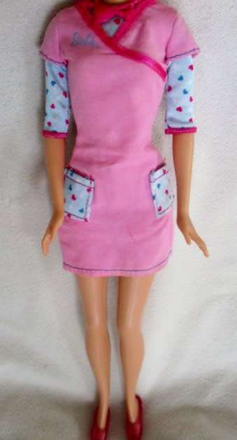 MATTEL  BARBIE DOLL WITH PRETTY BOB HAIRSTYLE AND WEARING ORIGINAL BARBIE DRESS!