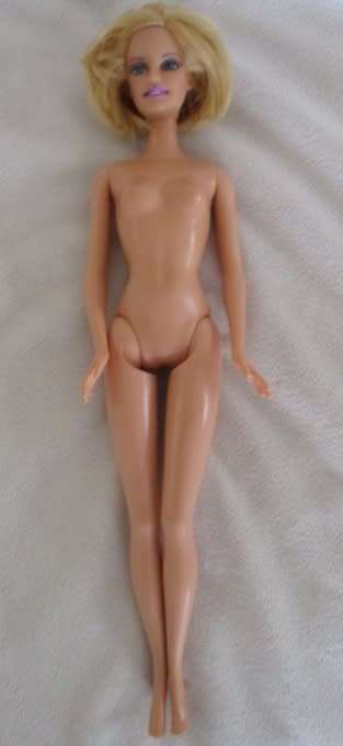 MATTEL  BARBIE DOLL WITH PRETTY BOB HAIRSTYLE AND WEARING ORIGINAL BARBIE DRESS!