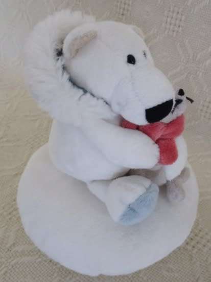 A NICI POLAR BEAR HOLDING A BABY SEAL AND HIS WIMPY POLAR BEAR FRIEND