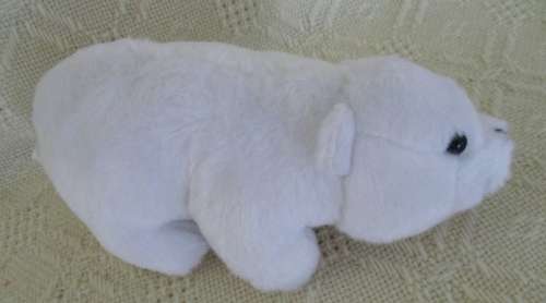 A NICI POLAR BEAR HOLDING A BABY SEAL AND HIS WIMPY POLAR BEAR FRIEND