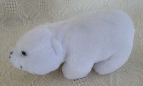 A NICI POLAR BEAR HOLDING A BABY SEAL AND HIS WIMPY POLAR BEAR FRIEND