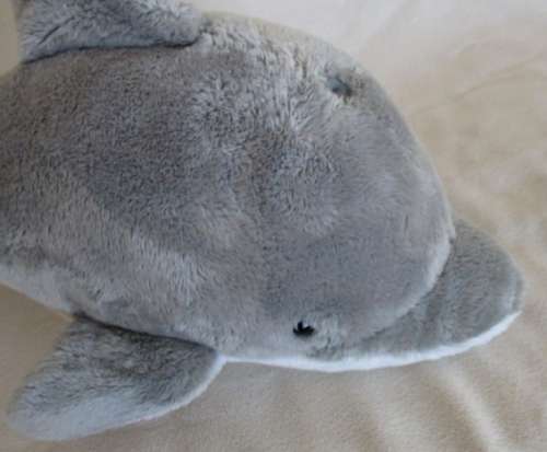 A SOFT GREY WELL MADE NICI DOLPHIN