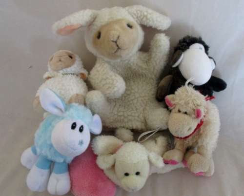 A MEILI, SWITZERLAND LAMB HAND PUPPET AND FIVE LITTLE LAMBS - OF THE COLLECTABLE KIND!
