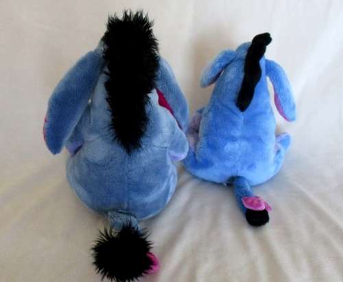 TWO CUTE EEYORES FROM WINNIE THE POOH - ONE SAD AND ONE CONTENTED