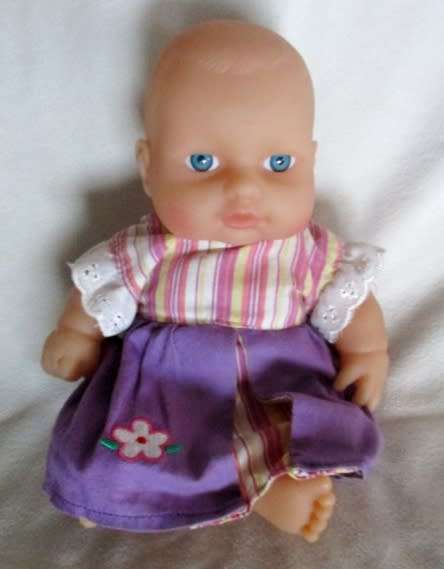 A VERY COLLECTABLE SMALL SUM SUM ANATOMICALLY CORRECT BABY DOLL WITH TWO CUTE FRONT TEETH!