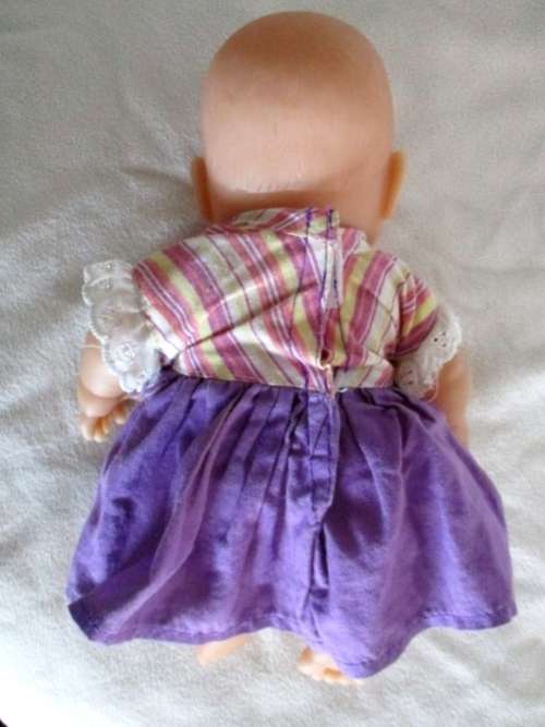 A VERY COLLECTABLE SMALL SUM SUM ANATOMICALLY CORRECT BABY DOLL WITH TWO CUTE FRONT TEETH!