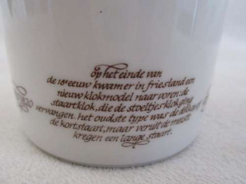 FOUR MITTERTEICH COFFEE CUPS AND SAUCERS - HOLLAND CLOCK DESIGN NO'S 1 TO 4