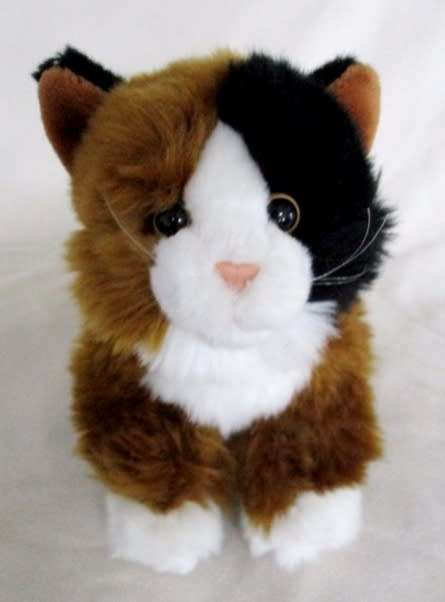 A CUTE FLUFFY LEOSCO KITTY CAT IN GREAT CONDITION WITH ORIGINAL MEDALLION AND LABEL