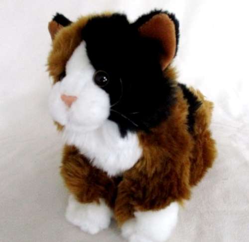 A CUTE FLUFFY LEOSCO KITTY CAT IN GREAT CONDITION WITH ORIGINAL MEDALLION AND LABEL