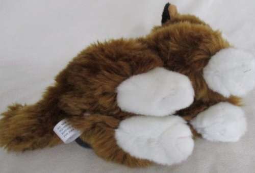 A CUTE FLUFFY LEOSCO KITTY CAT IN GREAT CONDITION WITH ORIGINAL MEDALLION AND LABEL