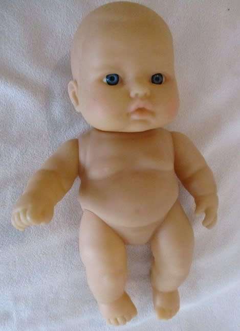 A VERY COLLECTABLE SMALL SUM SUM CHUBBY BABY DOLL