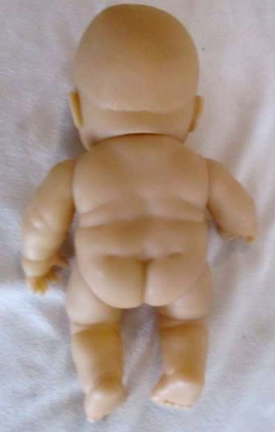 A VERY COLLECTABLE SMALL SUM SUM CHUBBY BABY DOLL