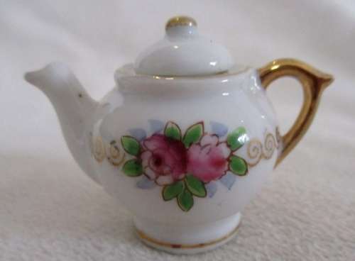 THE PRETTIEST, DELICATE PORCELAIN TEA SET TO DISPLAY WITH YOUR COLLECTABLE BEARS AND DOLLS!