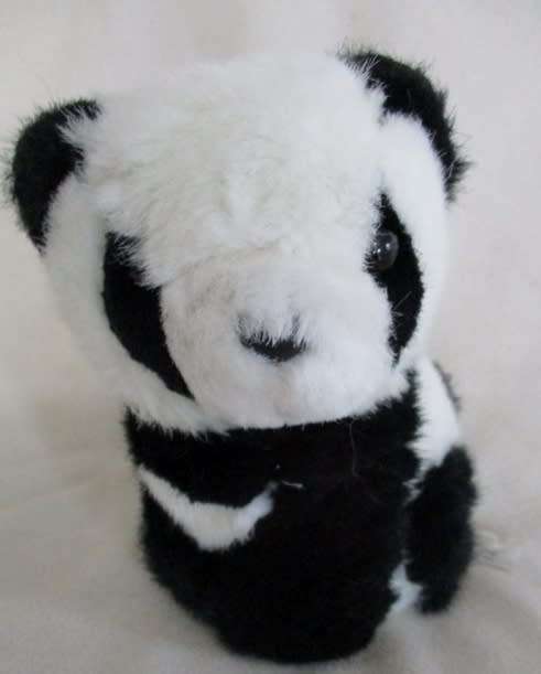 A CUTE, SMALL, COLLECTABLE IKEA, SWITZERLAND PANDA BEAR