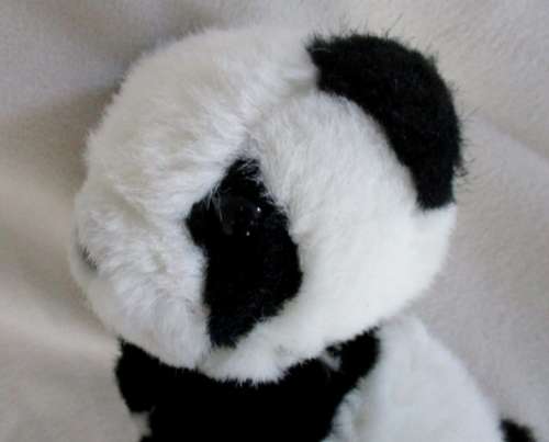 A CUTE, SMALL, COLLECTABLE IKEA, SWITZERLAND PANDA BEAR